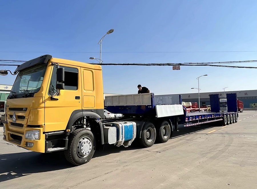80-100 Tons 5 Axles Lowboy Trailer with Hydraulic Ramps for Heavy Mining Equipment