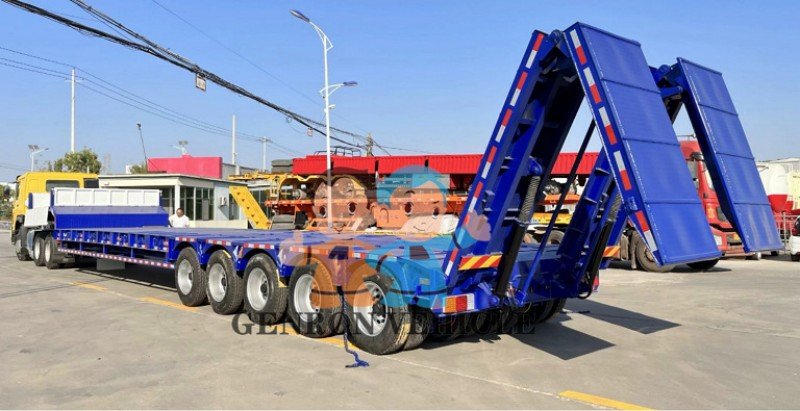 Nigerian client inspecting a 5-line 10-axle modular low bed trailer at Genron Vehicle factory