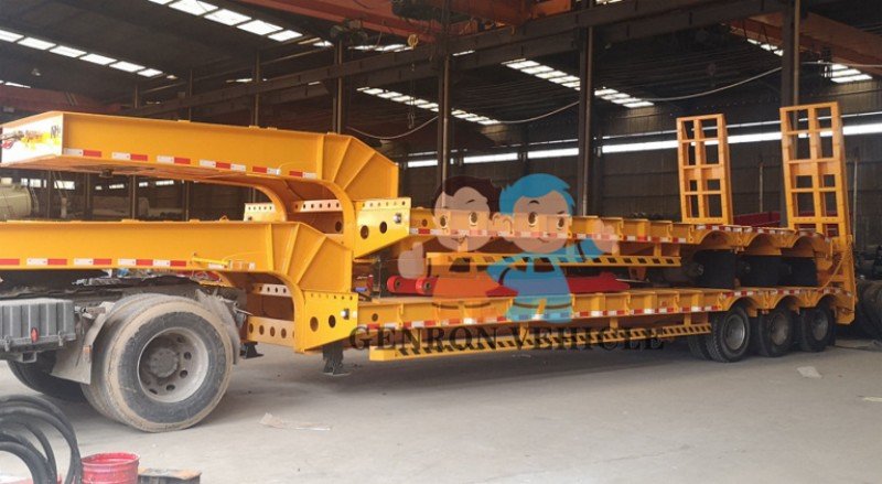 Cost-saving stacked packaging method for exporting modular low bed semi trailers