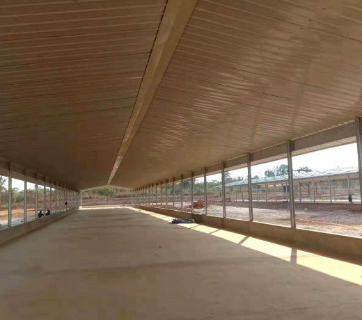 Open chicken coops in the Democratic Republic of the Congo feature concrete foundations and steel frame beams and columns