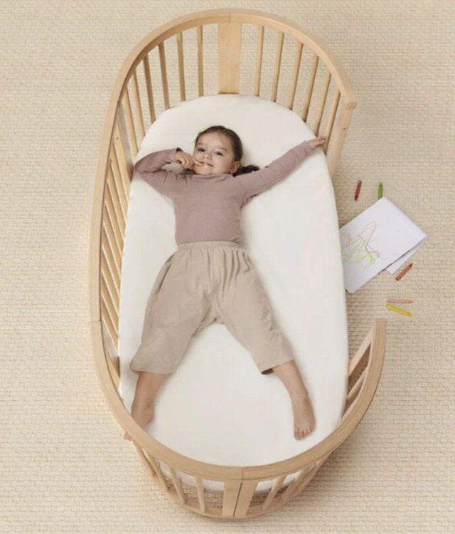 Sleepi Oval Convertible Baby Crib – Grow-With-Me Wooden Nursery Bed
