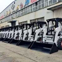 skid steer loader working in construction site