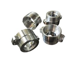 CNC post-machined stainless steel and aluminum alloy fluid piping assemblies