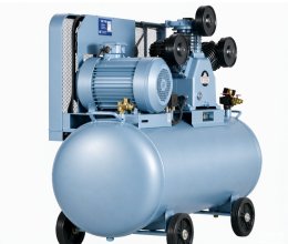 Belt-driven oil-free compressor