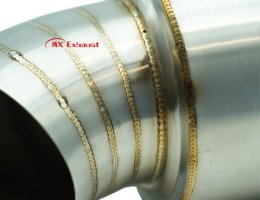 angled outlet exhaust muffler for improved airflow and exhaust direction