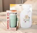 Winter gift set with hot water bottle and cup