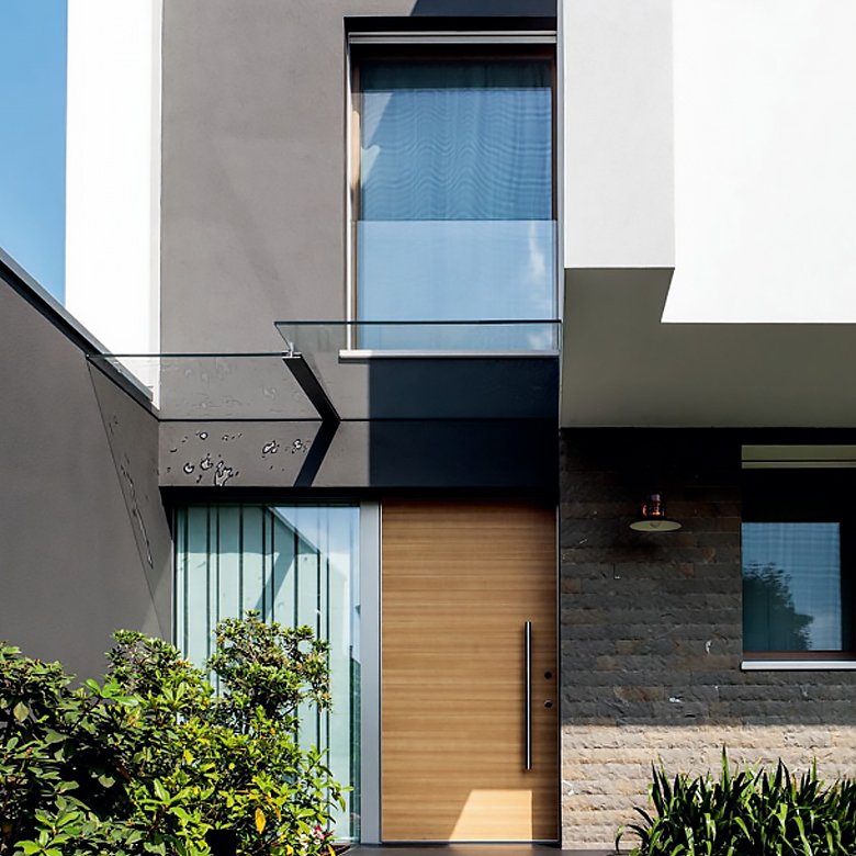 Single swing entrance door