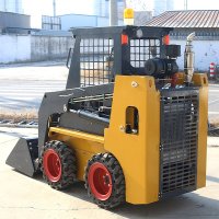 Wheeled skid steer loader on road