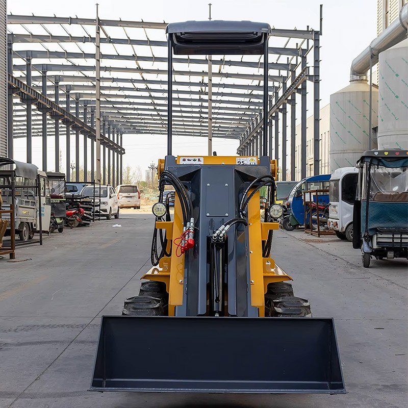 skid loader operating on construction site