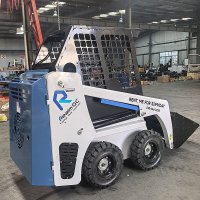 Crawler skid steer loader on rough terrain