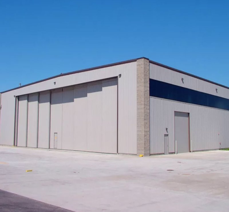 Conception de hangar laitier à structure en acier préfabriquée lourde de haute qualité Q235/Q355, haute résistance