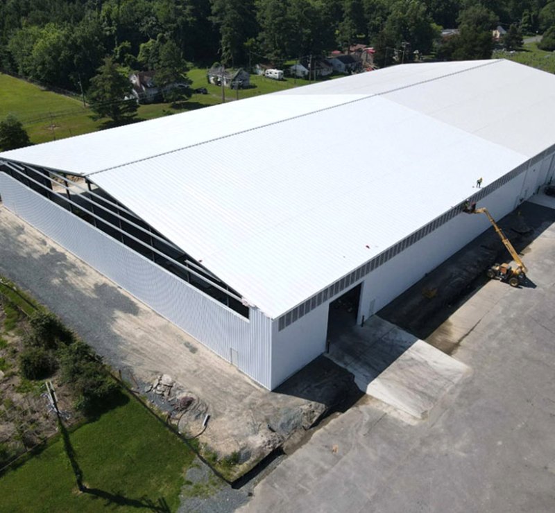 Ingénieur en structures métalliques pour bâtiments industriels sans colonnes - Consultant en ingénierie - Bâtiment de stockage à grande portée