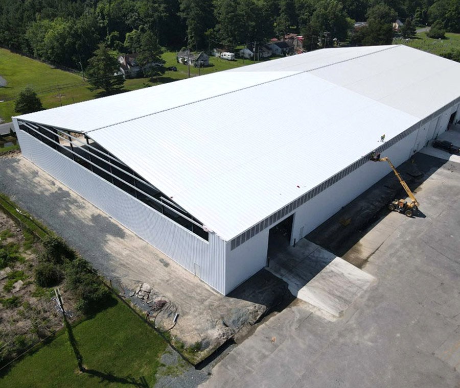 Ingénieur en structures métalliques pour bâtiments industriels sans colonnes - Consultant en ingénierie - Bâtiment de stockage à grande portée