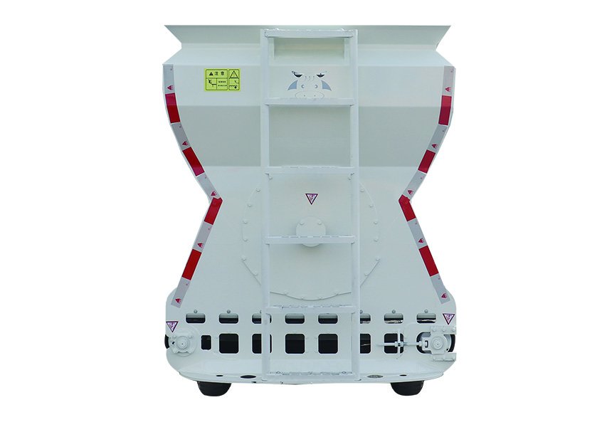 Compact hydraulic feed spreader