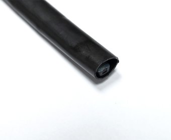 Inlaid pressure compensating drip irrigation pipe