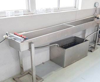 Drip-line water flow testing unit