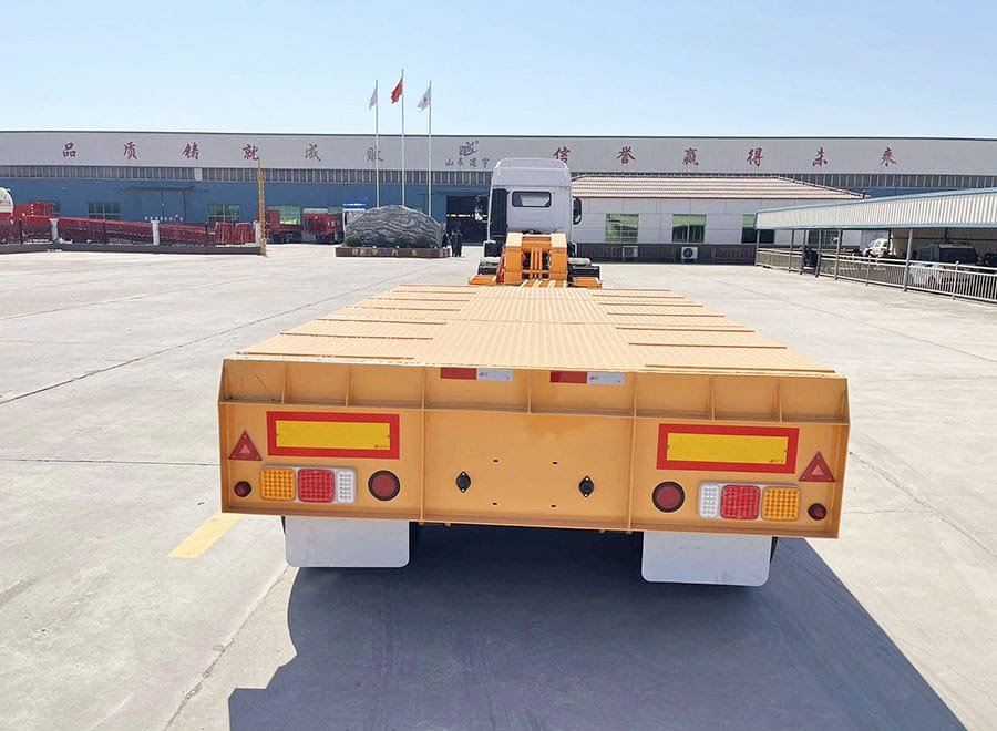 Ultra low deck machinery trailer