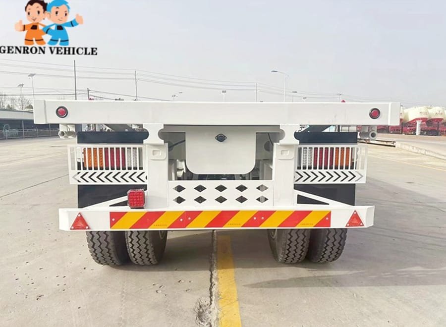 5 axle flatbed trailer carrying machinery